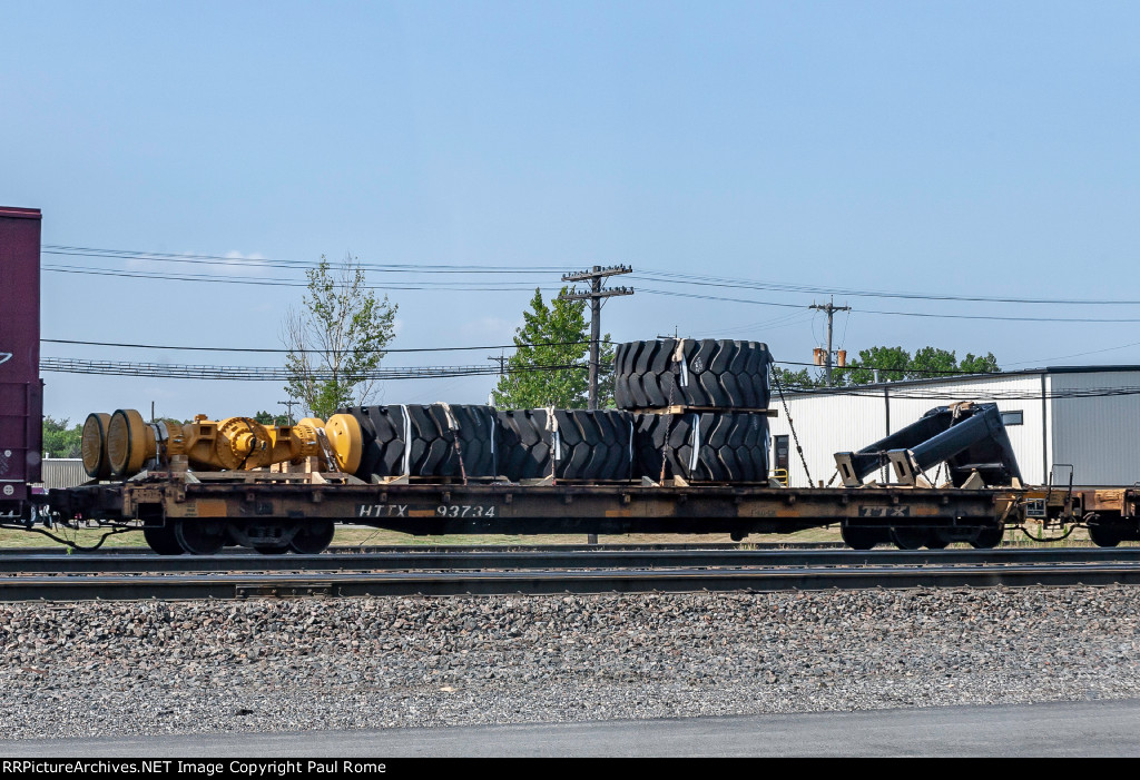 HTTX 93734, 60ft Flat Car with CAT parts on the BNSF at Eola Yard